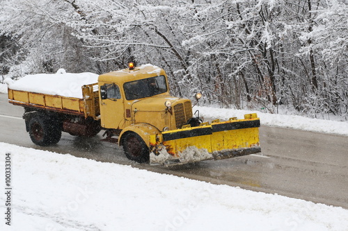 Truck snowblowers, machinery with snowplough cleaning road