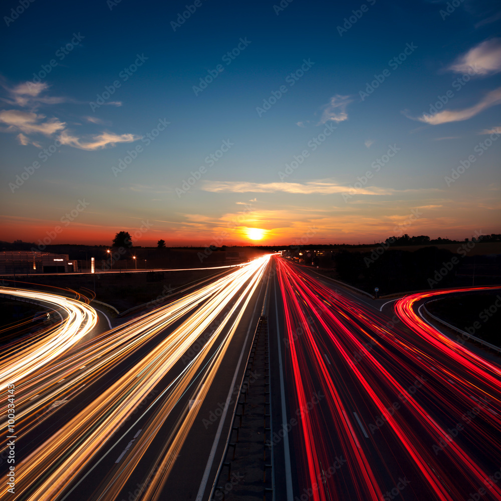 Speed Traffic  long exposure on motorway highway at sundown
