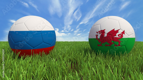     3D soccer balls with Russia and Wales flag  Euro 2016. Placed on 3d grass. Background isolated with clipping path. 