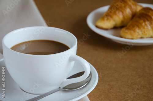 Cup of Coffee and Croissant for Breakfast.