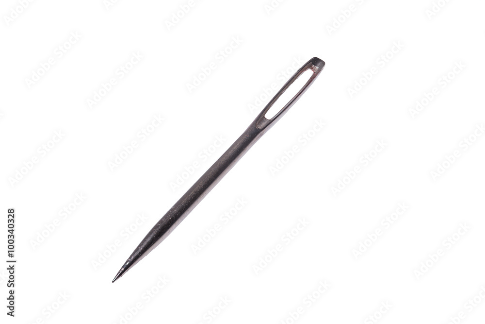 Highly detailed view of a sewing needle with a large eyelet isolated on a white background Highly detailed view of a sewing needle with a large eyelet isolated on a white background