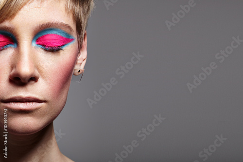 Canvas Print woman with a closed eyes wears a bright matte eyeshadows
