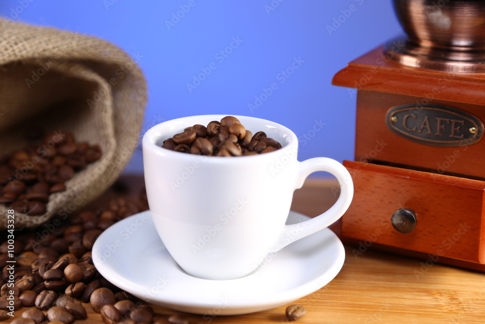 manual coffee grinder ,beans and cup