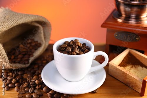 manual coffee grinder ,beans and cup