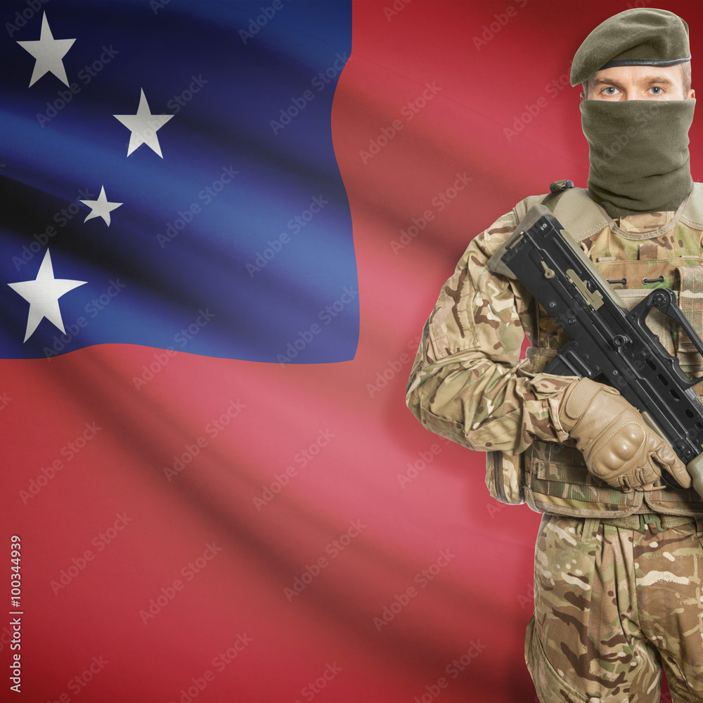 Fototapeta premium Soldier with machine gun and flag on background - Samoa