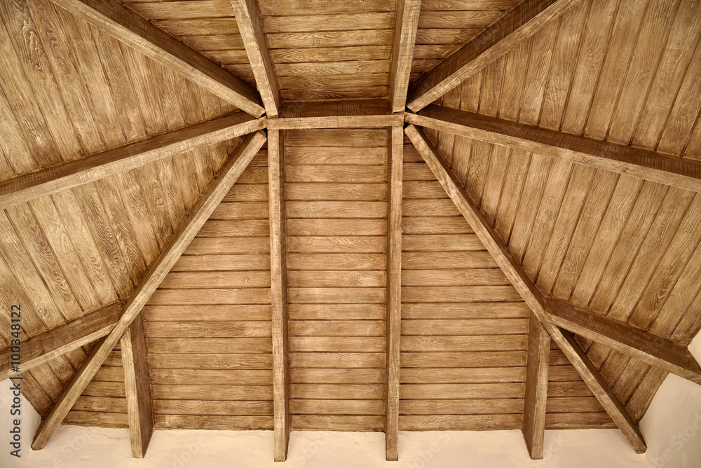 The exposed wooden ceiling
