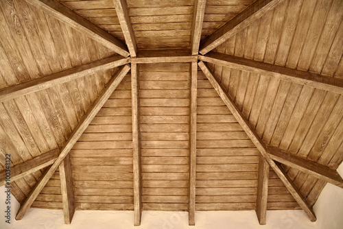 The exposed wooden ceiling