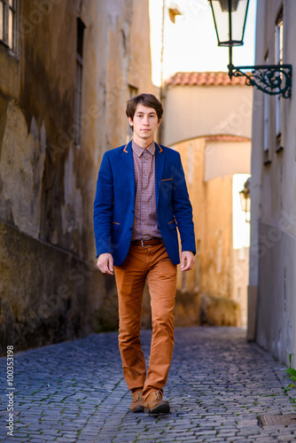 portrait of young man, dressed in a blue jacket