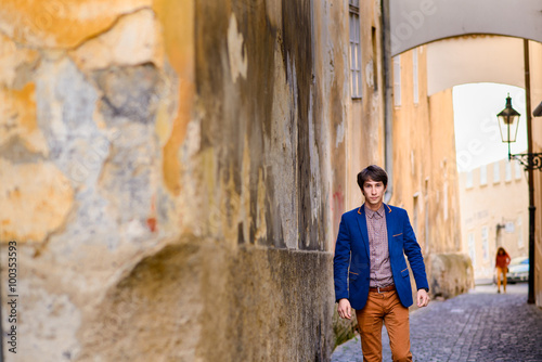 portrait of young man, dressed in a blue jacket