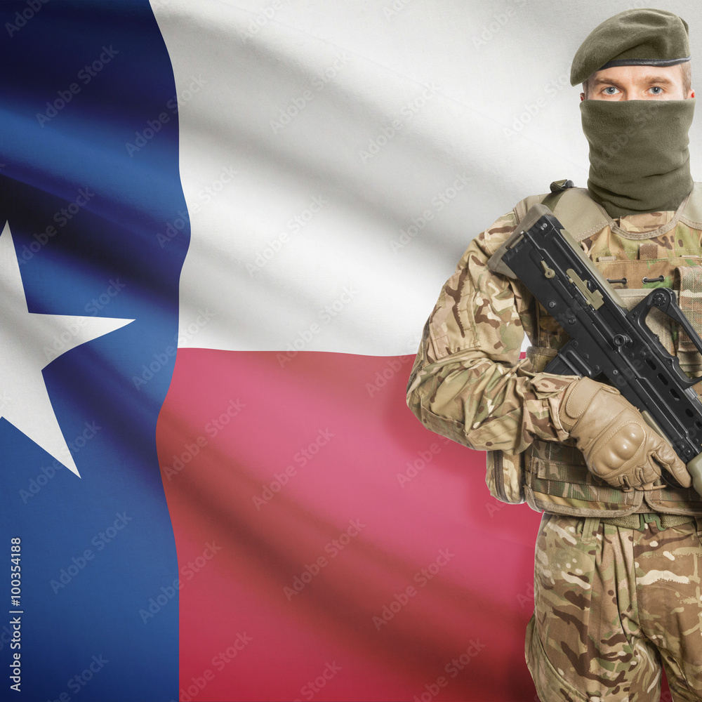 Soldier with machine gun and USA state flag on background - Texas Soldier with machine gun and USA state flag on background - Texas
