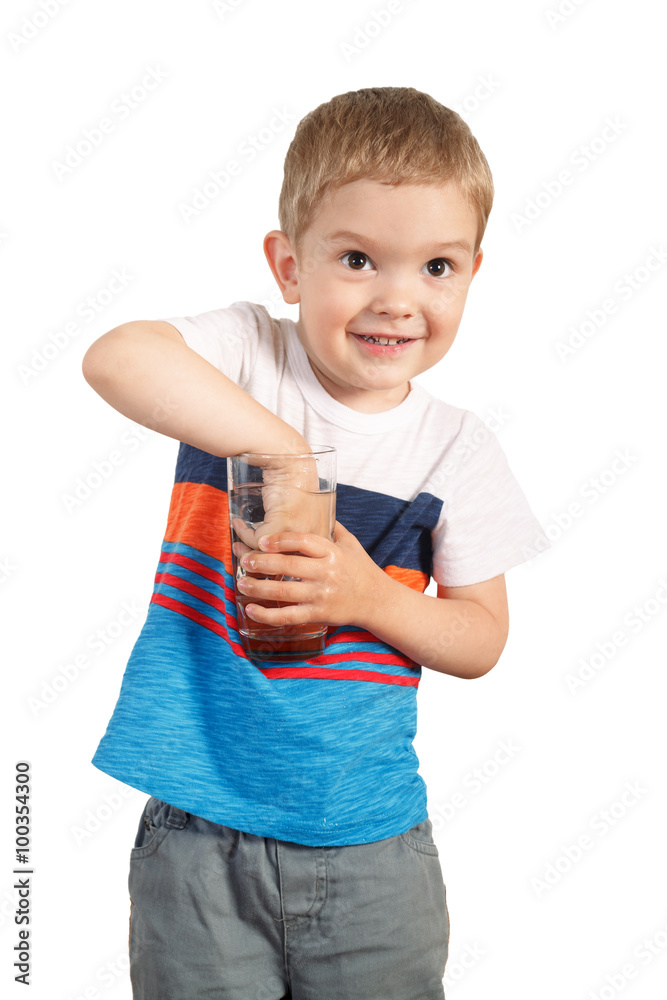 toddler boy holding glass with ice water. isolated on white toddler boy holding glass with ice water. isolated on white