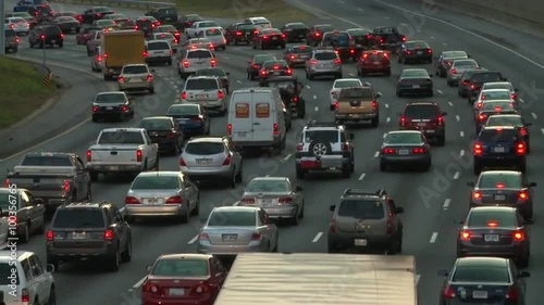 Traffic jam, heavy slow moving traffic on the freeway in a big city, Atlanta Georgia. photo