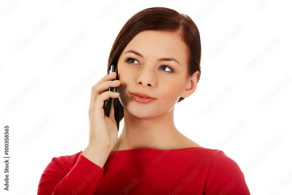 Young student woman talking through a mobile phone Young student woman talking through a mobile phone