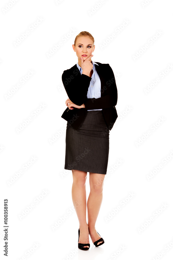 Young serious thoughtful business woman Young serious thoughtful business woman