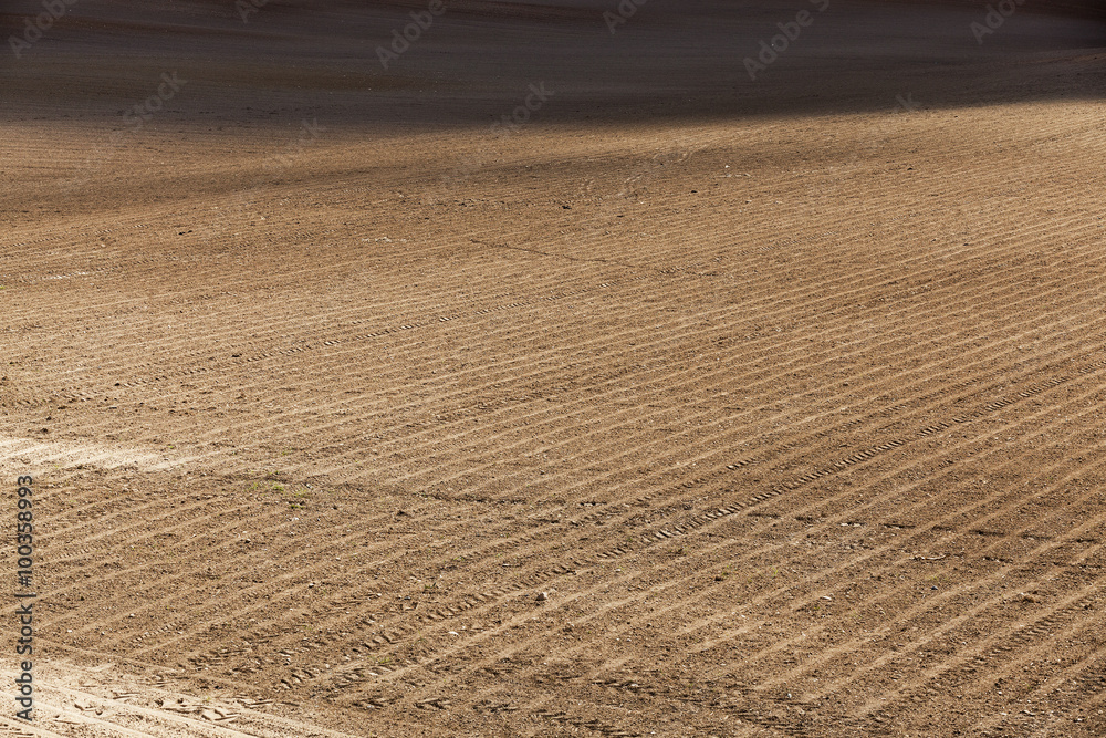 plowed agricultural field plowed agricultural field