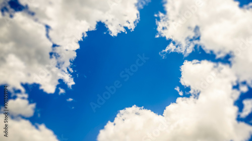 blue window in the cloudy sky - tilt shift selective focus effect photo