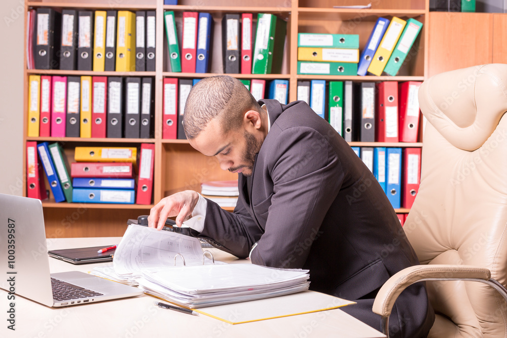 doubting african man in office doubting african man in office