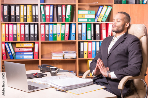 meditating relaxing man in office
