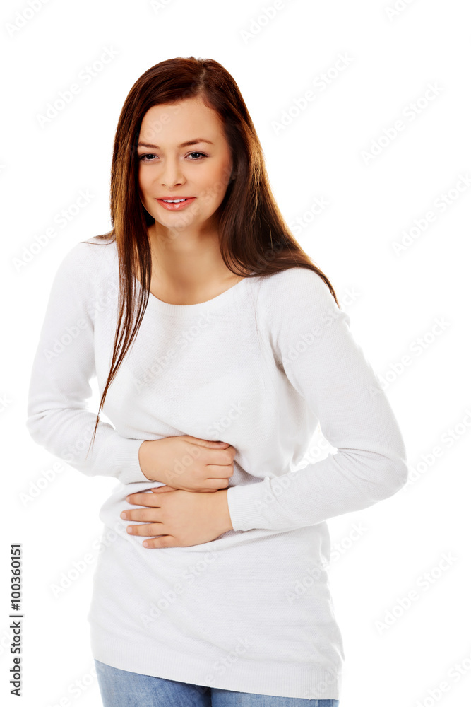 Young woman with stomach pain from laugh Young woman with stomach pain from laugh