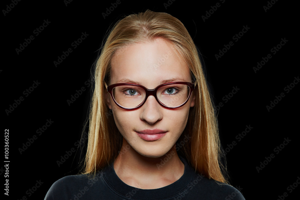 Young blonde woman with glasses Young blonde woman with glasses