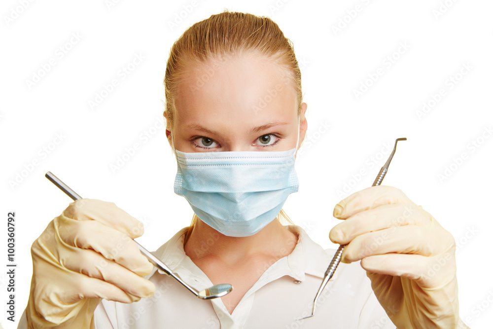 Female dentist with tools Stock Photo Adobe Stock