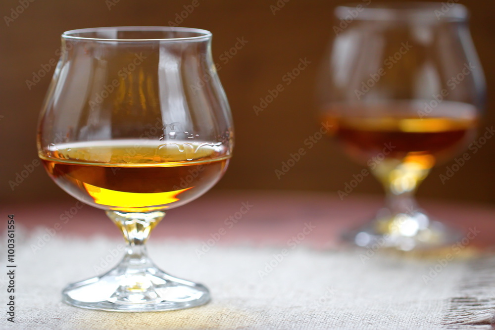 Glass of cognac on the table Glass of cognac on the table