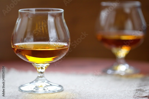 Glass of cognac on the table