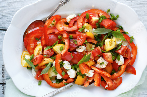 summer salad with paprika and tomatoes photo