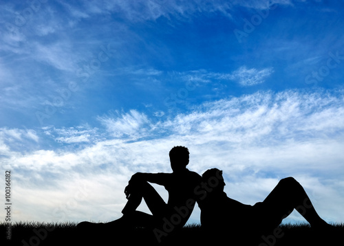 Silhouette of two gay men