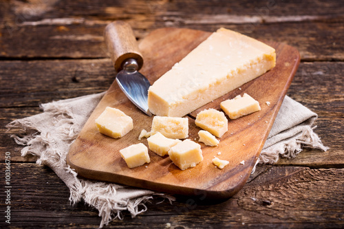 Obraz na płótnie parmesan cheese on wooden board