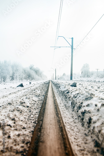 Gradient colorize railway in the winter forest, view from