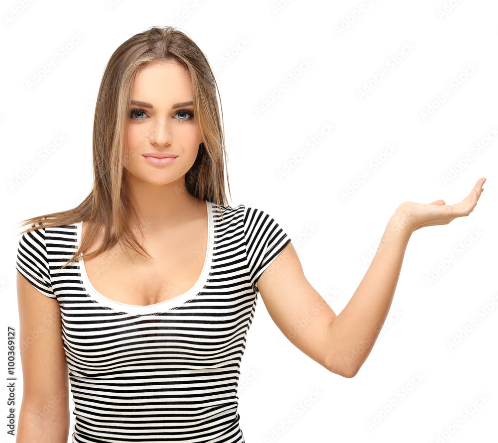 Girl showing empty copy space on the open hand palm. Girl showing empty copy space on the open hand palm.