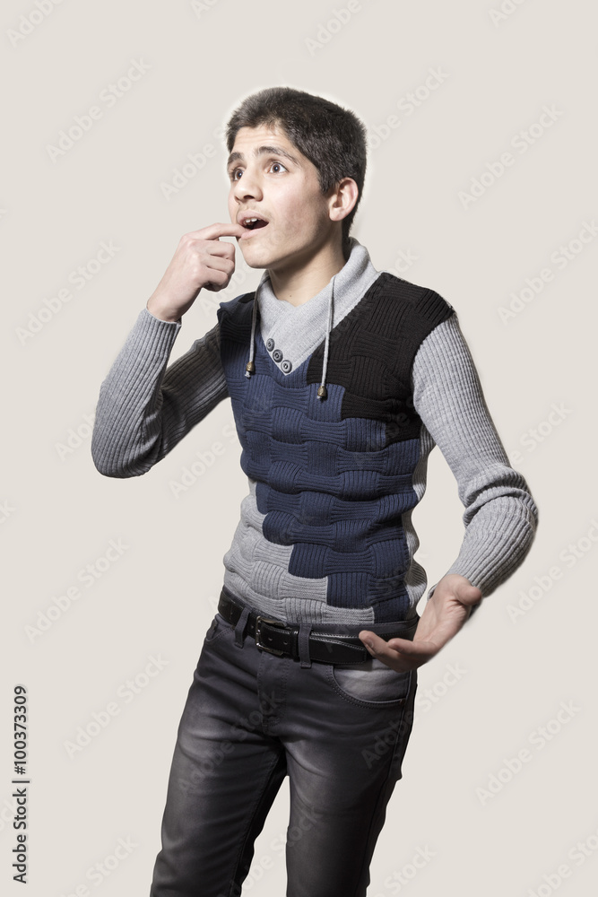Fototapeta premium Iraqi boy suffering from toothache isolated on white background 