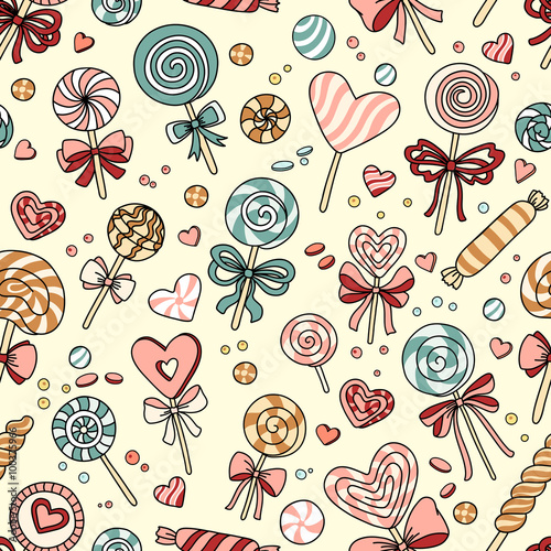 Vector seamless pattern with candy and lollipops