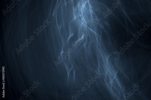 Glowing abstract curved light blue and white lines