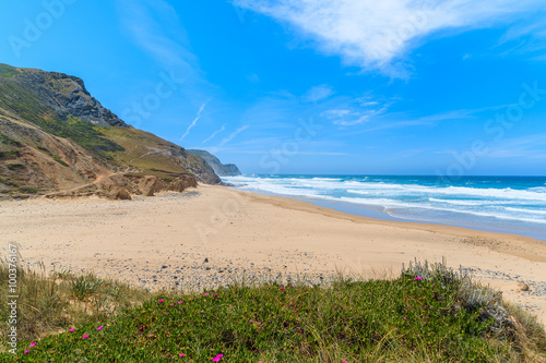 A view of sandy Castelejo beach, famous place for surfing, Algarve region, Portugal