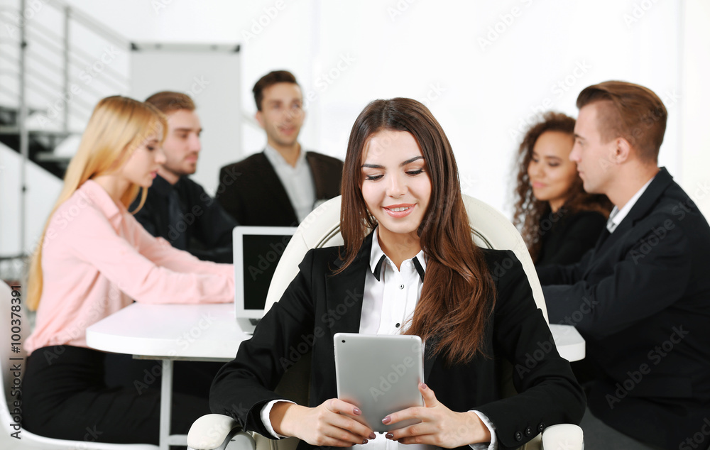 Photo of business woman with her staff in conference room at the meeting Photo of business woman with her staff in conference room at the meeting
