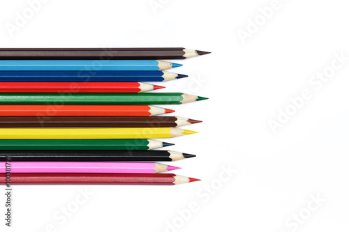 sharp sharpened colored pencils on a white background - statione