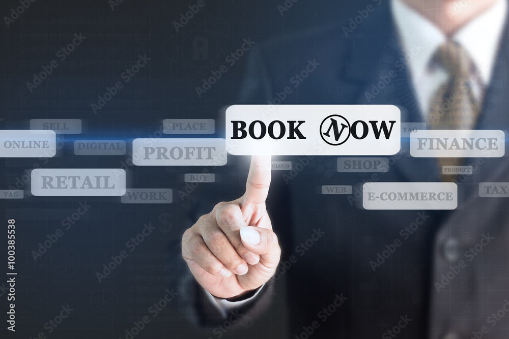 Businessman pressing a BOOK NOW concept button. Can be used in advertising. Businessman pressing a BOOK NOW concept button. Can be used in advertising.