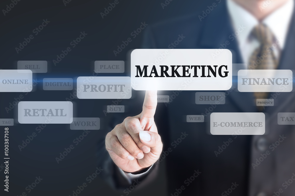Businessman pressing MARKETING concept button. Can be used in advertising. Businessman pressing MARKETING concept button. Can be used in advertising.