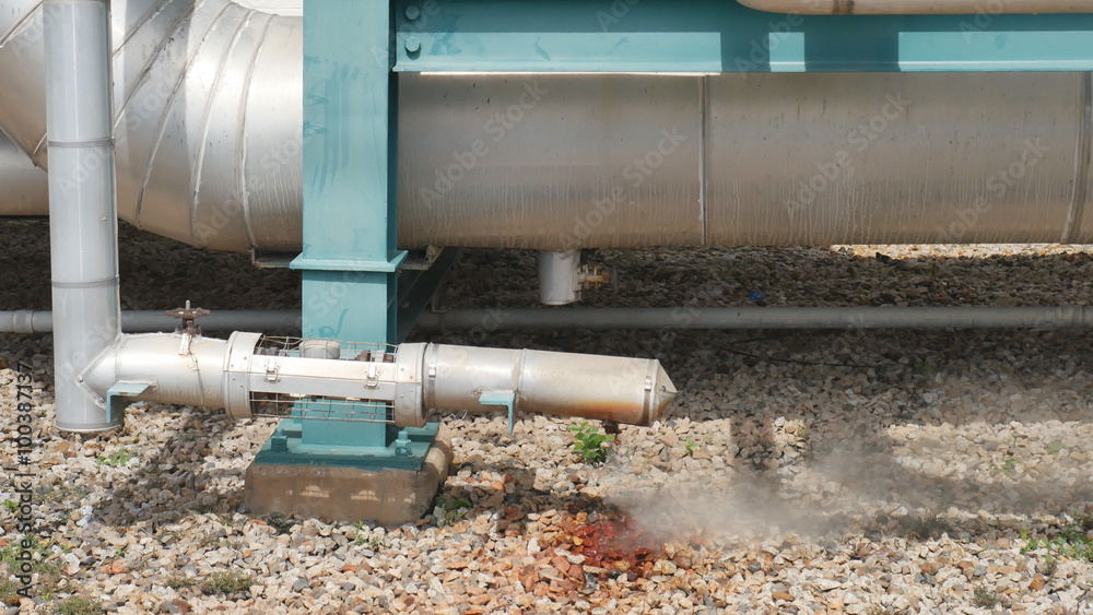 Hot steam blowing from pipe , Steam pipe line in industrial plant Hot steam blowing from pipe , Steam pipe line in industrial plant