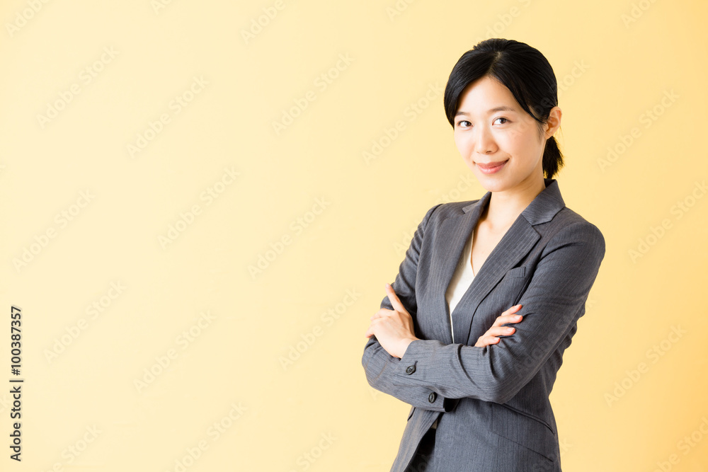 asian businesswoman isolated on yellow background asian businesswoman isolated on yellow background