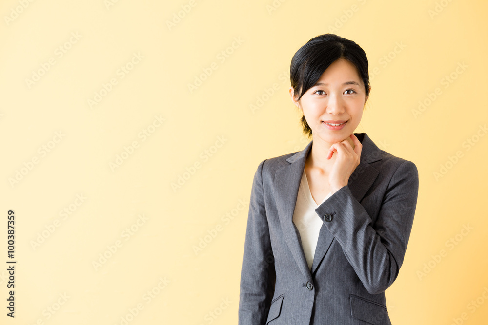 asian businesswoman isolated on yellow background asian businesswoman isolated on yellow background