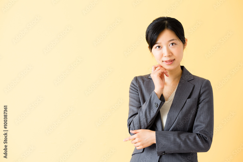 asian businesswoman isolated on yellow background asian businesswoman isolated on yellow background