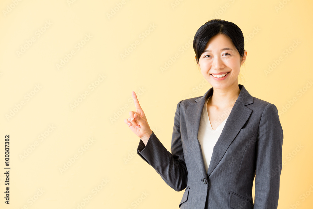 asian businesswoman isolated on yellow background asian businesswoman isolated on yellow background