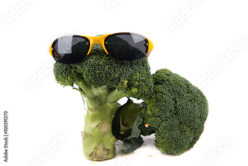 broccoli wearing sungrasses on white background photo