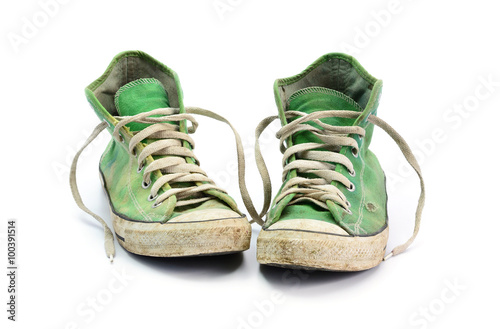 dirty sneakers isolated on a white background