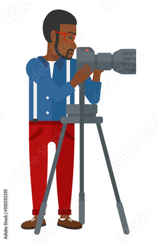 Photographer working with camera.
