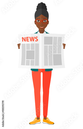 Reporter reading newspaper.