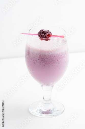 Blackberry smoothie on the wooden background